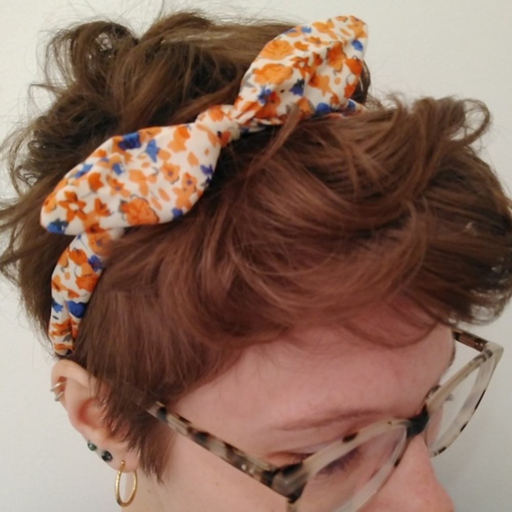 Orange flower pattern headband ears blue white